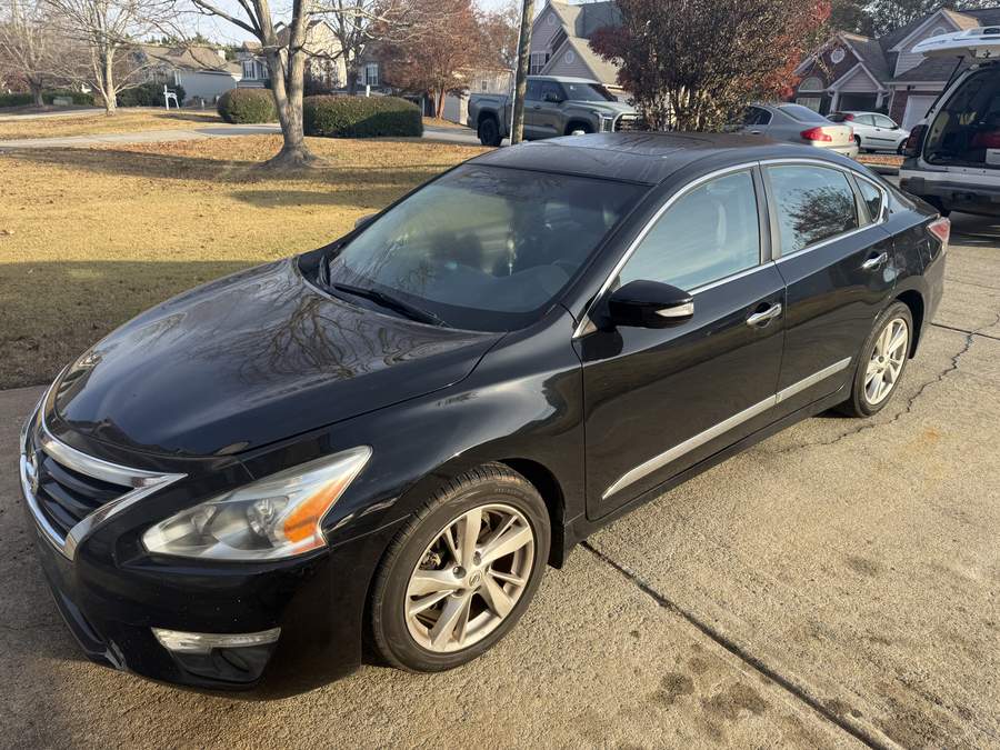 Black Nissan Altima before exterior detail - Revive Detailing Dallas GA